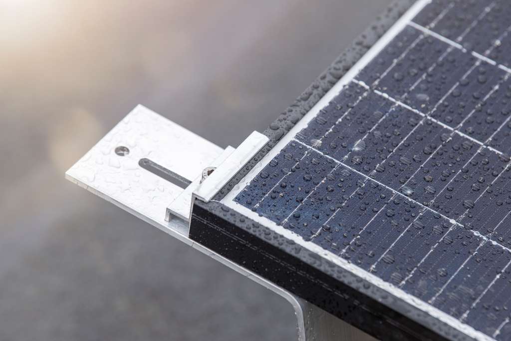 Solar panel and bracket in the rain.