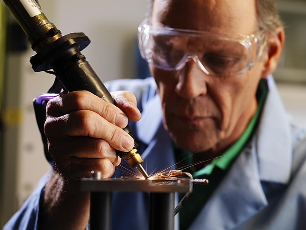 Scientist working on a solar cell. 