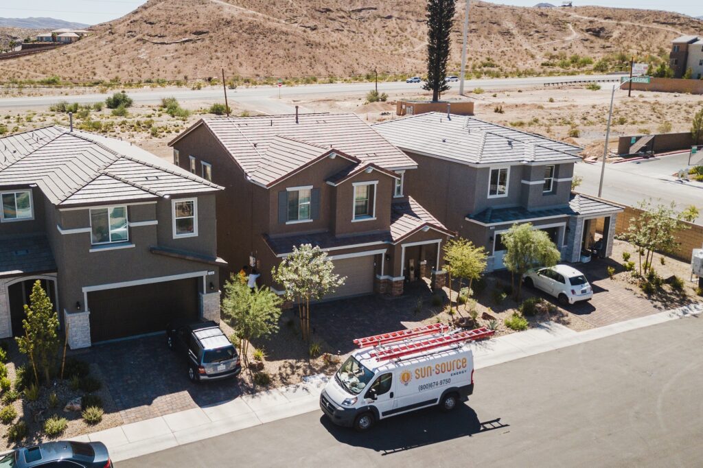 Las Vegas homes with a Sun Source Energy installation crew arriving.