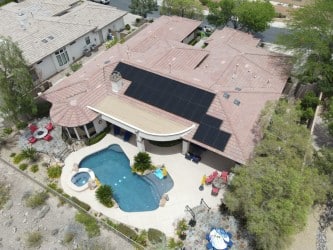 A large home with solar on the roof.