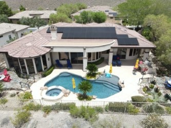 A large home with solar on the roof.